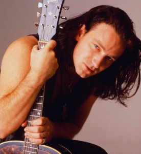 Bono of U2 Holding a Guitar --- Image by © MR Photo/CORBIS